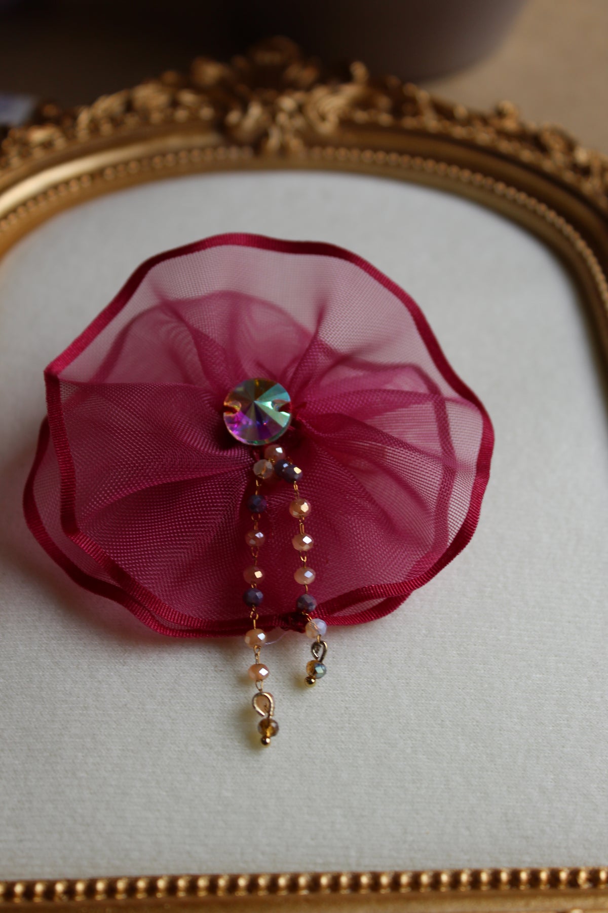 Carol brooch in magenta