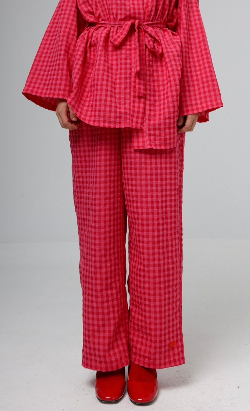 “Citrus” pants in hot pink plaid