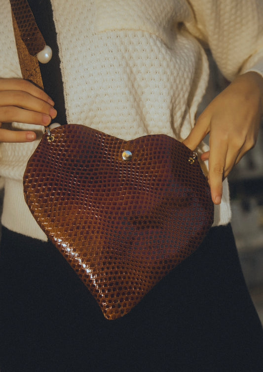 “Luv” mini bag in brown snake
